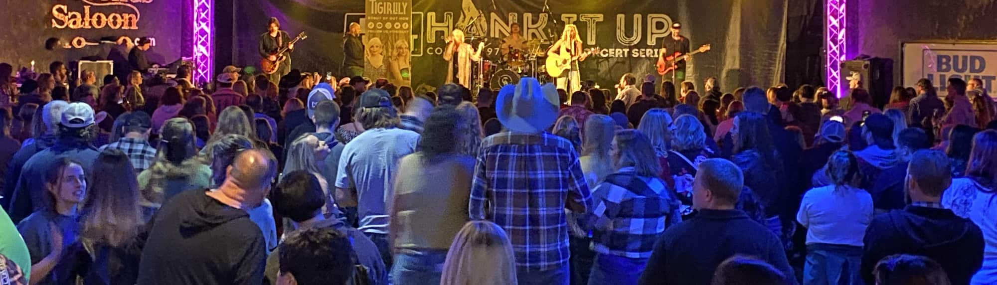 country concert with fans wearing cowboy hats Shreveport